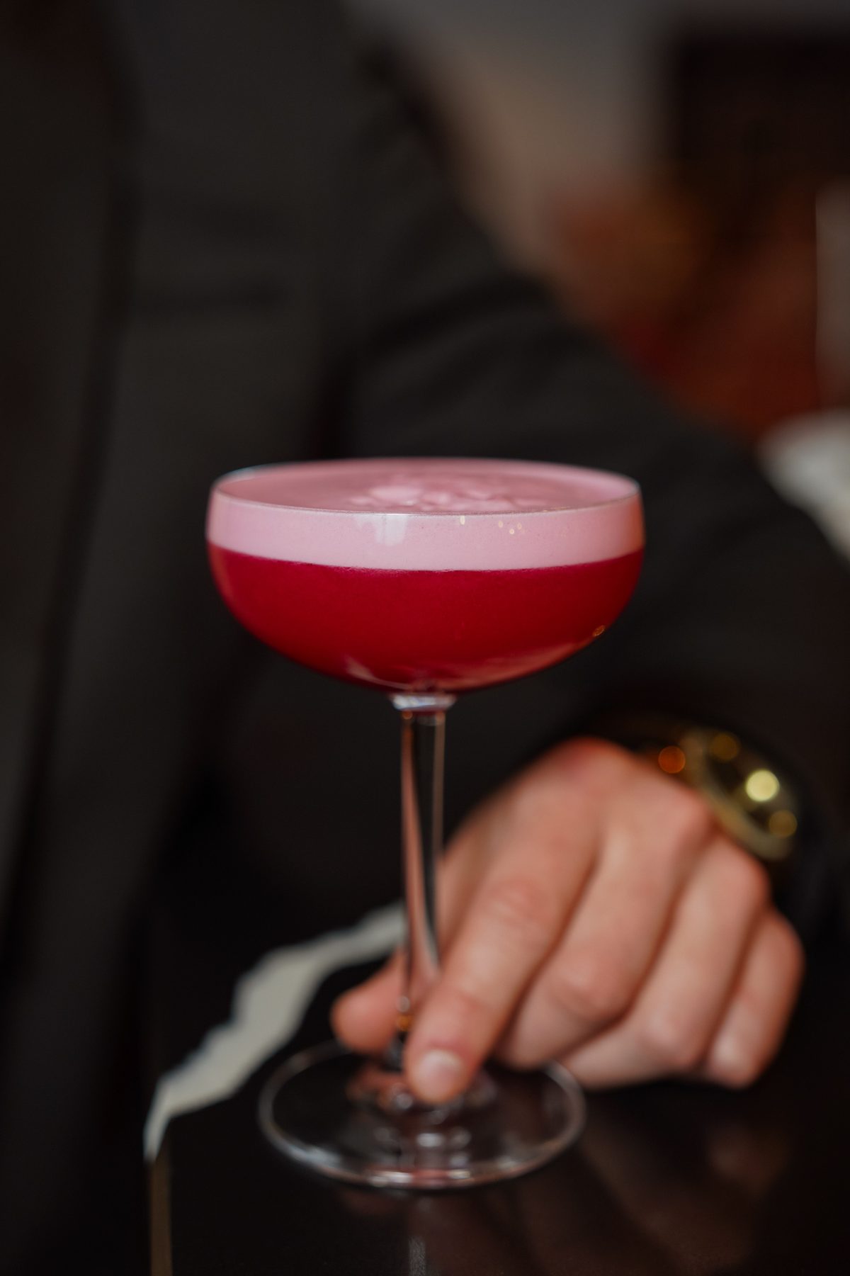 A Tipsy bartender serving cocktails at an event