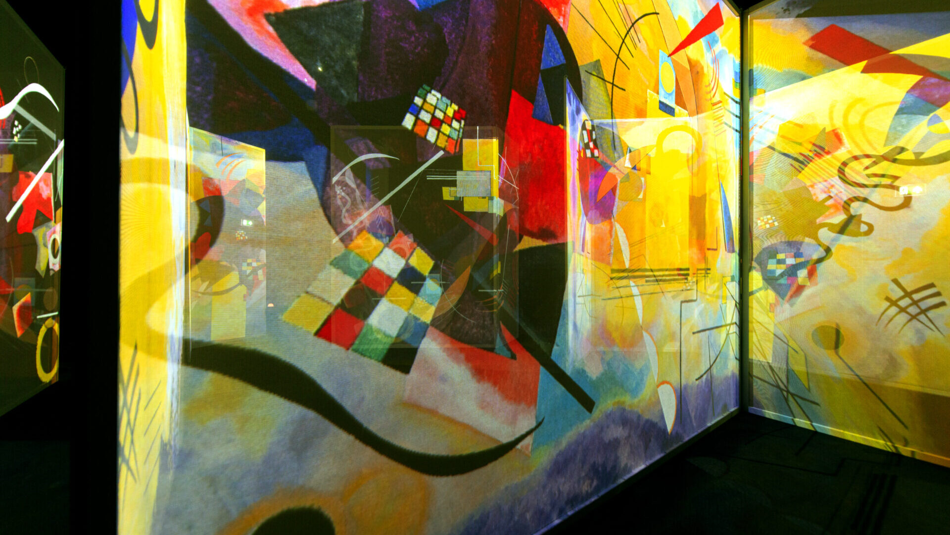 A Kandinsky painting projected across the walls and floor of a Frameless gallery
